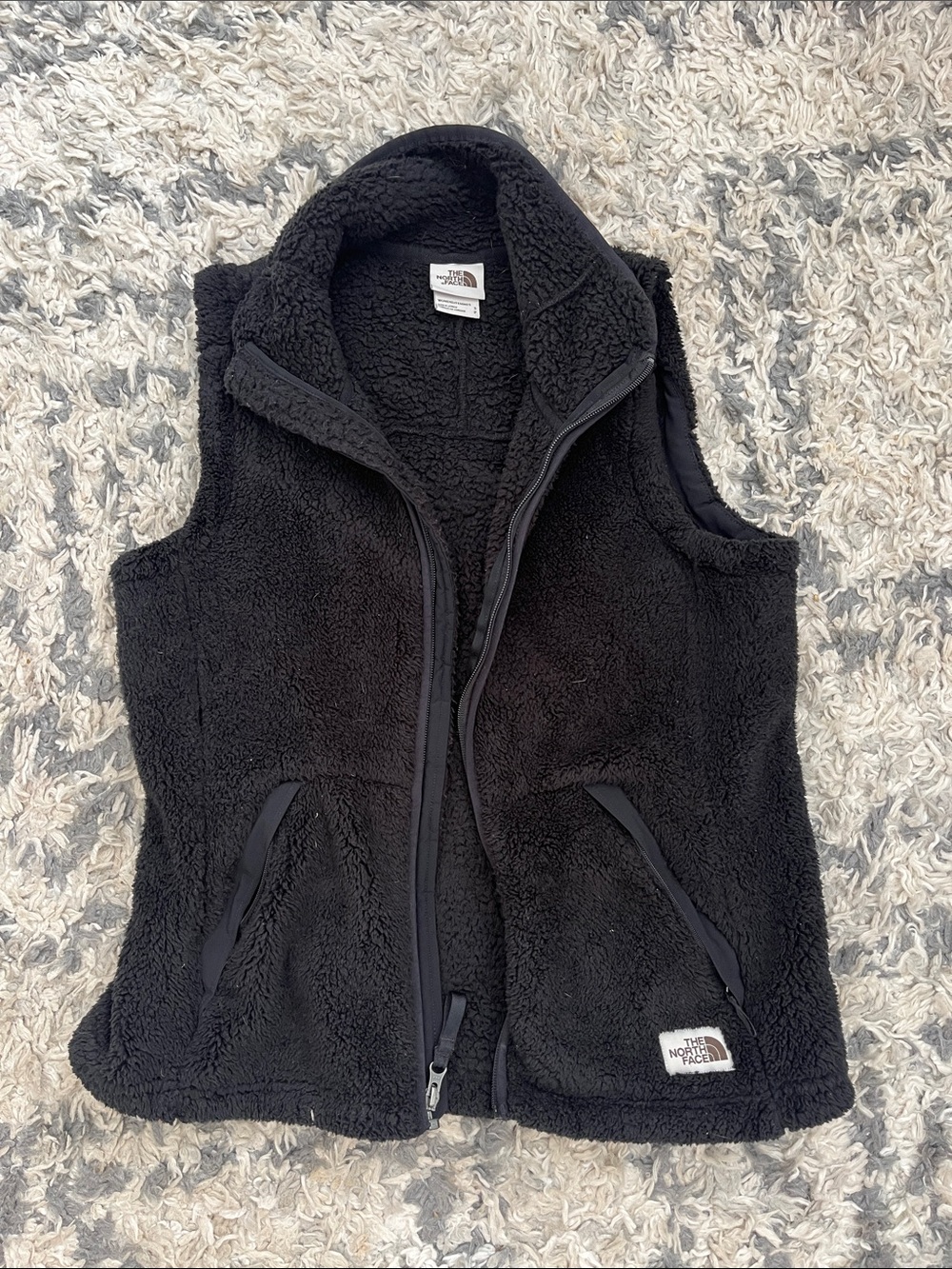 The North Face Black Sherpa Vest with Zip Pockets